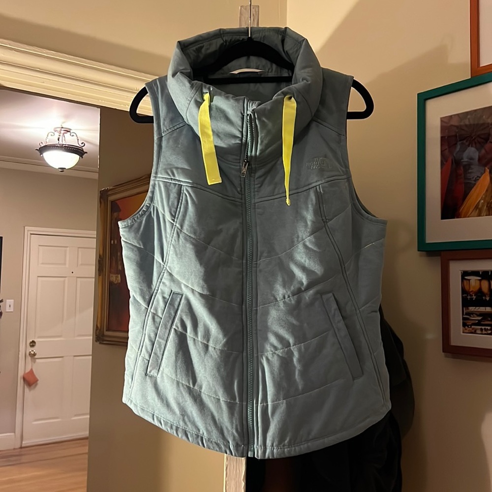 Northface vest. Super cute colors barely worn.
